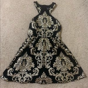 B. Darlin Black and Gold Skater Dress Halter Neck